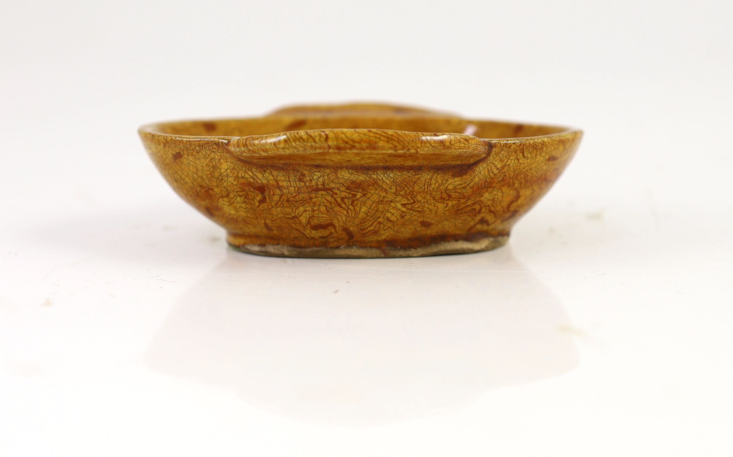 A Chinese amber glazed marbled pottery ear cup, possibly Tang/Liao dynasty, 10.5cm